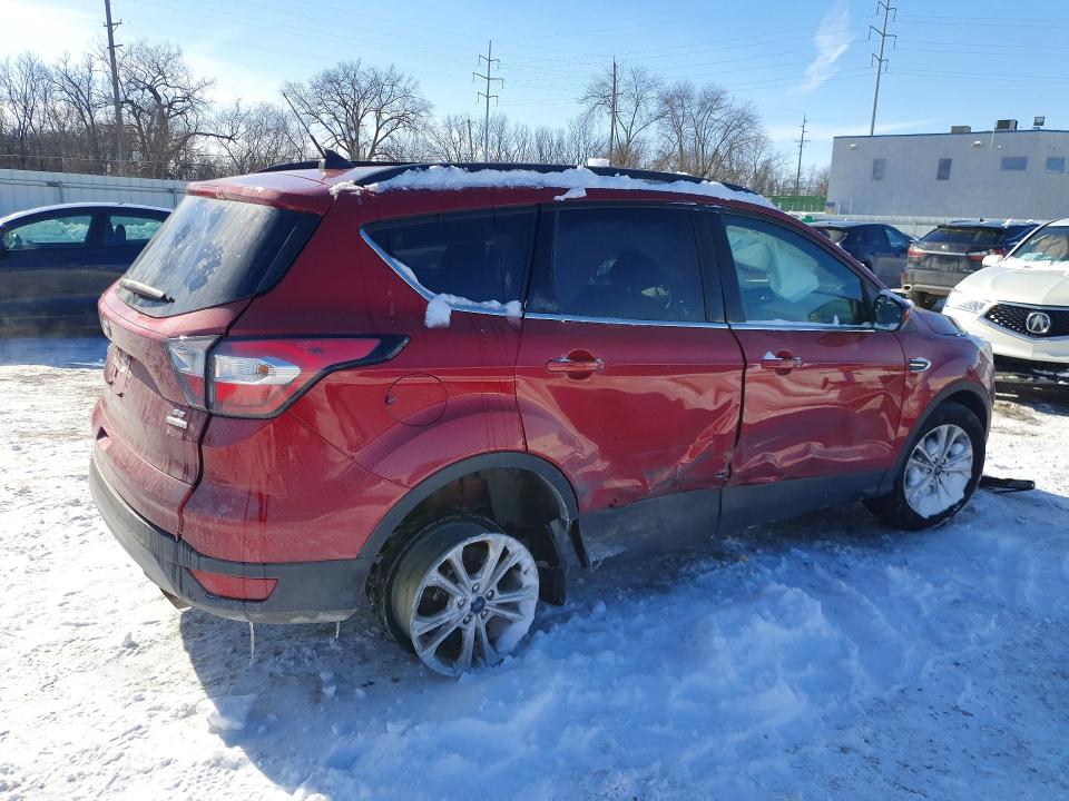 Photo 3 from auction – 2018 FORD ESCAPE with VIN 1FMCU0GD7JUD03258