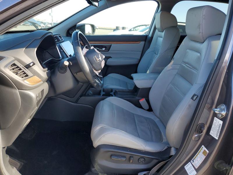 Photo 7 from auction – 2018 HONDA CR-V with VIN 7FARW1H86JE021397