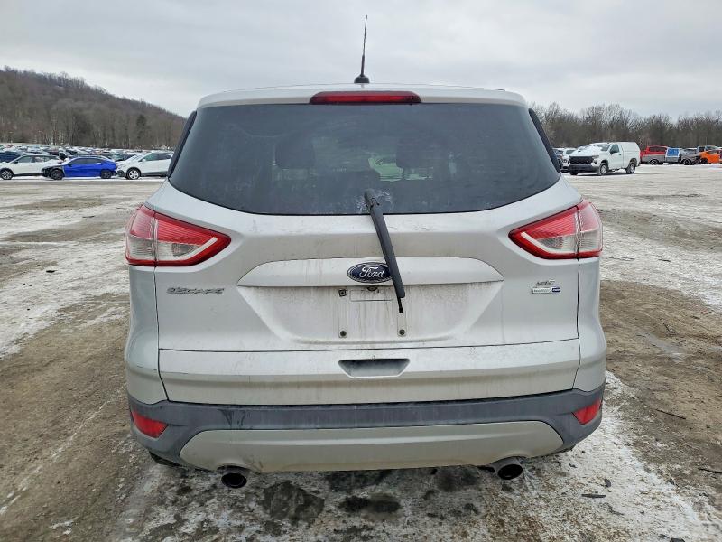 Photo 6 from auction – 2016 FORD ESCAPE with VIN 1FMCU9GX1GUB68611