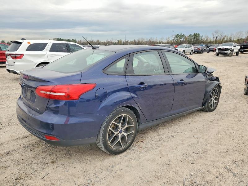 Photo 3 from auction – 2017 FORD FOCUS SEL with VIN 1FADP3H22HL344238