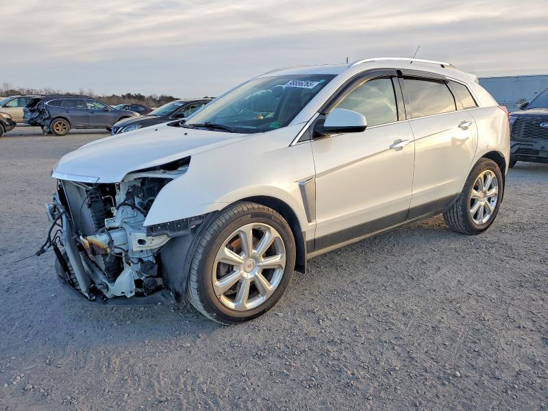 CADILLAC SRX PREMIU 2014 with VIN 3GYFNDE33ES583146 - Photo from auction