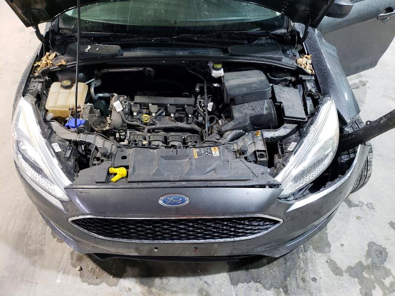 Photo 11 from auction – 2018 FORD FOCUS with VIN 1FADP3F25JL331038
