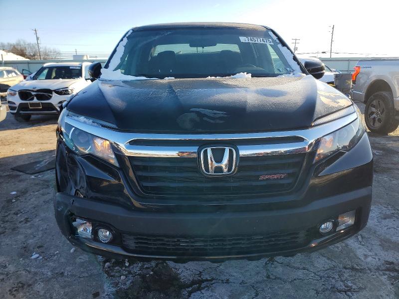 Photo 5 from auction – 2019 HONDA RIDGELINE with VIN 5FPYK3F11KB037228
