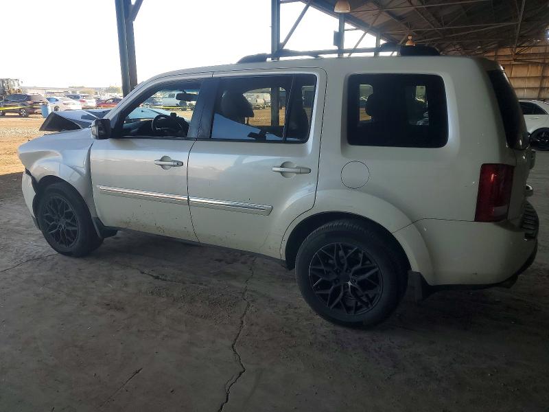 Photo 2 from auction – 2014 HONDA PILOT TOUR with VIN 5FNYF3H94EB016104