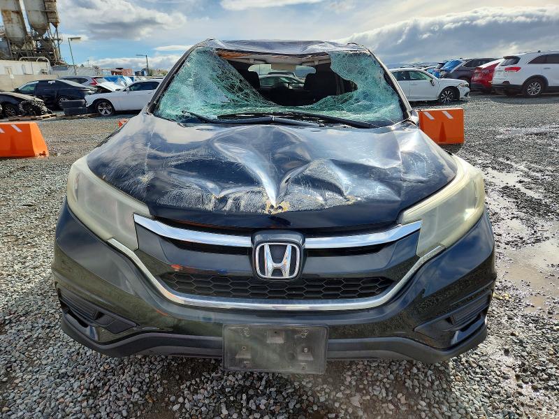 Photo 5 from auction – 2016 HONDA CR-V SE with VIN 2HKRM3H47GH559014