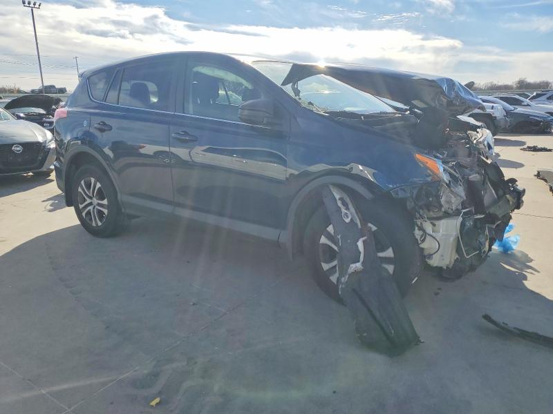 Photo 4 from auction – 2018 TOYOTA RAV4 LE with VIN JTMBFREV2JJ253669