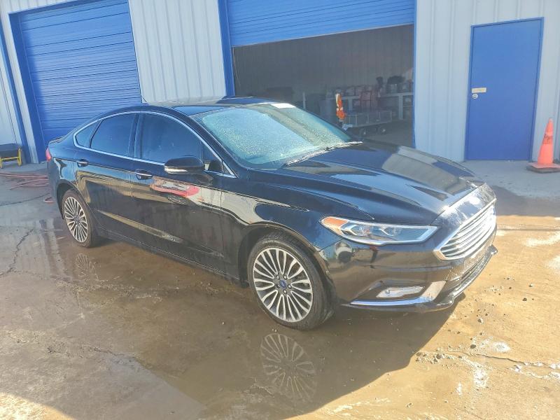 Photo 4 from auction – 2017 FORD FUSION TIT with VIN 3FA6P0K95HR339646