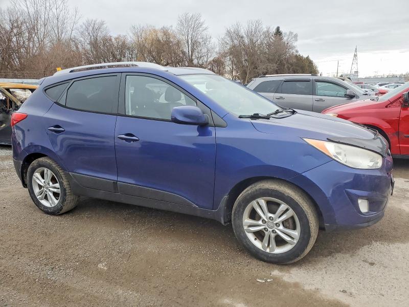 Photo 4 from auction – 2011 HYUNDAI TUCSON GLS with VIN KM8JUCAC4BU274179