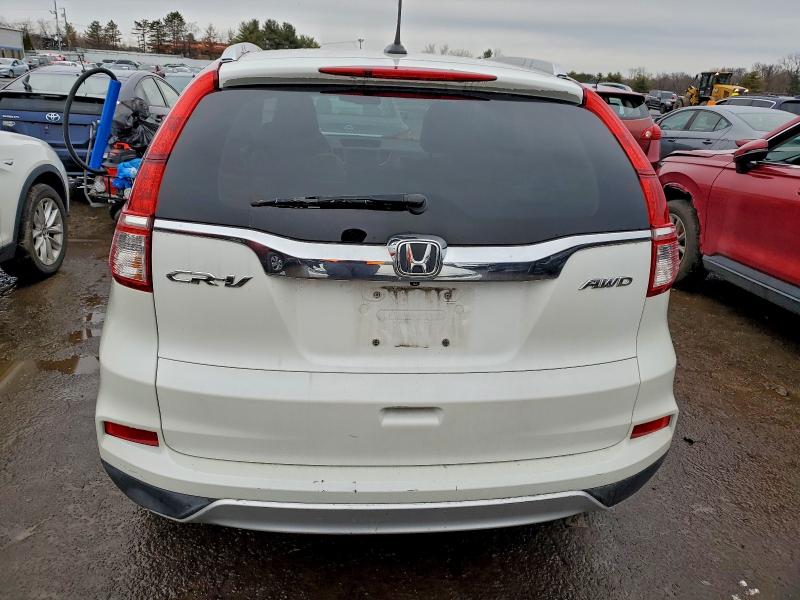 Photo 6 from auction – 2015 HONDA CR-V EXL with VIN 5J6RM4H75FL074908