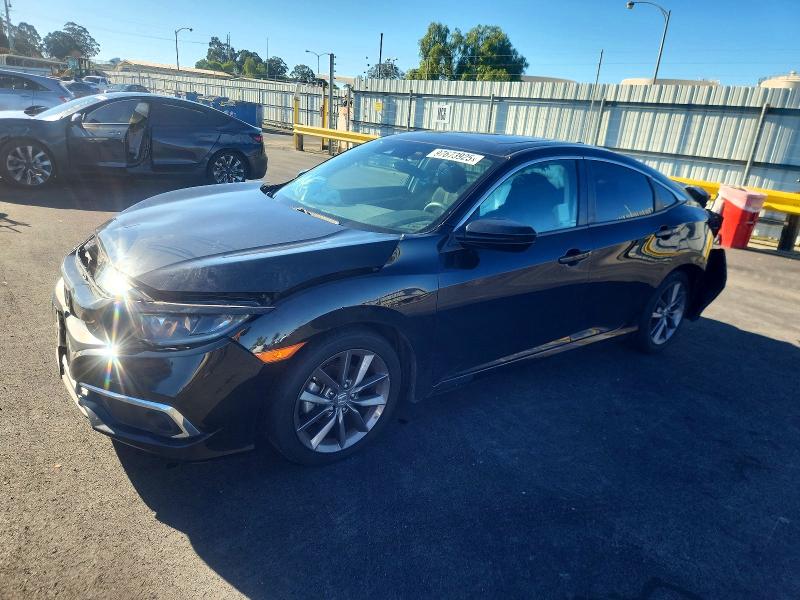 HONDA CIVIC EX 2021 with VIN 19XFC1F35ME203844 - Photo from auction