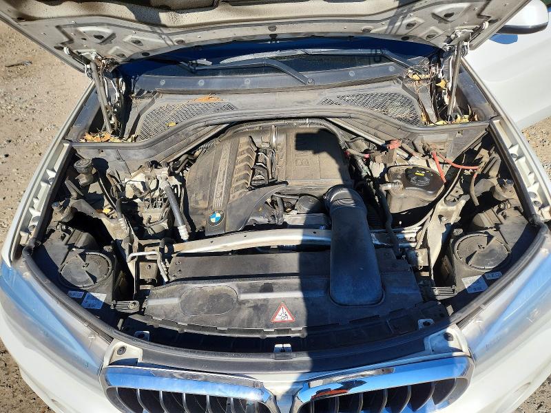 Photo 12 from auction – 2015 BMW X5 with VIN 5UXKR2C51F0H38367