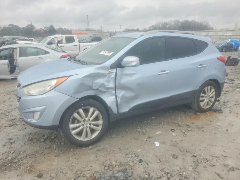Photo 1 from auction – 2011 HYUNDAI TUCSON with VIN KM8JU3ACXBU297028