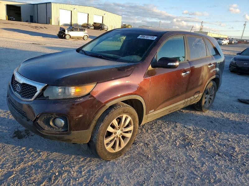 KIA SORENTO EX 2011 with VIN 5XYKUDA23BG026061 - Photo from auction
