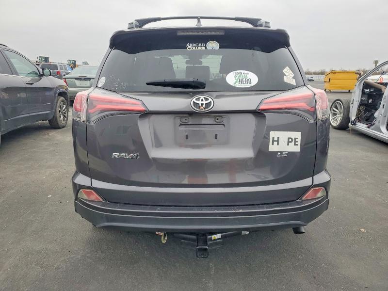Photo 6 from auction – 2018 TOYOTA RAV4 LE with VIN JTMZFREVXJJ178606