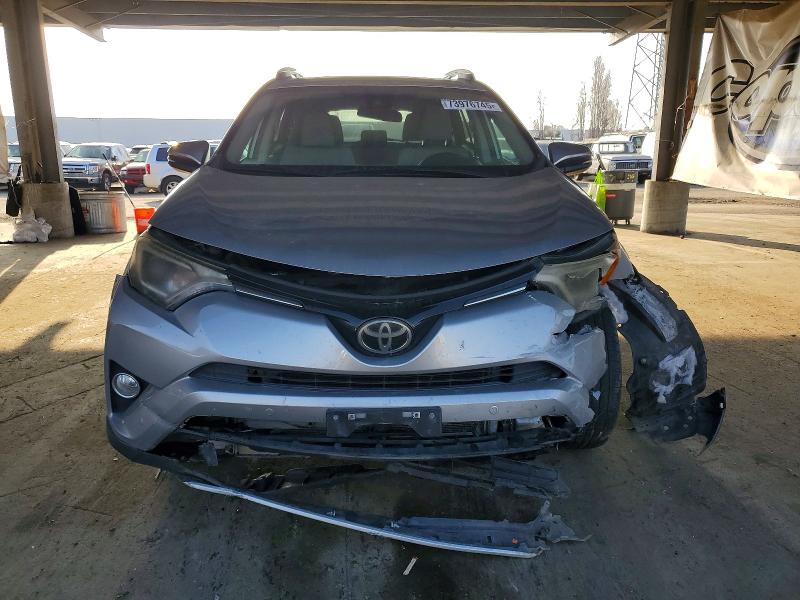 Photo 5 from auction – 2016 TOYOTA RAV4 XLE with VIN 2T3RFREV4GW428352