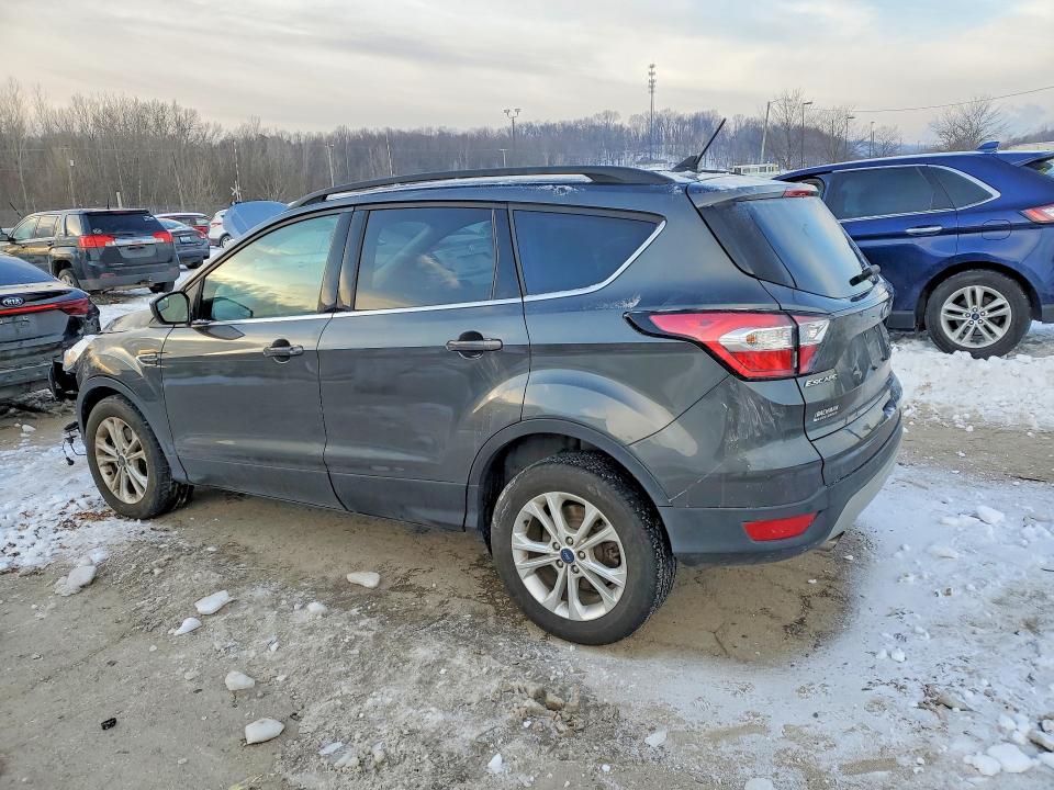 Photo 2 from auction – 2018 FORD ESCAPE with VIN 1FMCU9HD6JUB39424