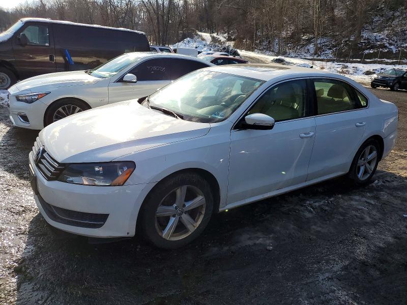 VOLKSWAGEN PASSAT 2013 with VIN 1VWBP7A3XDC024006 - Photo from auction