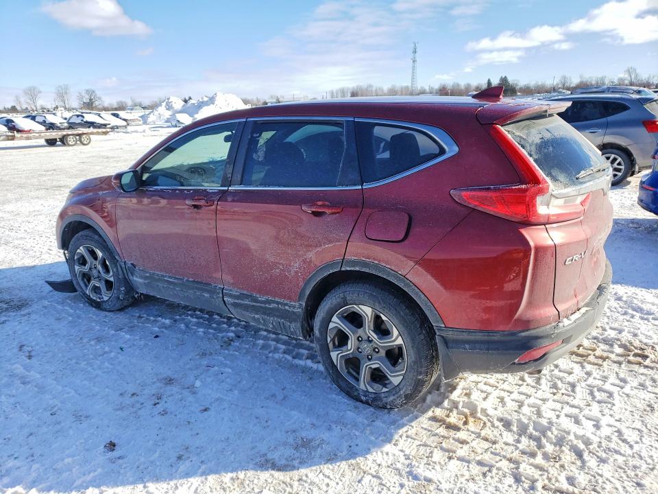 Photo 2 from auction – 2017 HONDA CR-V with VIN 2HKRW2H52HH128532
