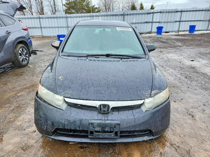 Photo 5 from auction – 2008 HONDA CIVIC DX-G with VIN 2HGFA164X8H105614