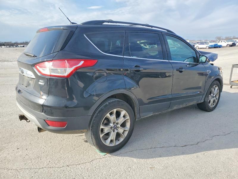 Photo 3 from auction – 2013 FORD ESCAPE SEL with VIN 1FMCU9H97DUB62971