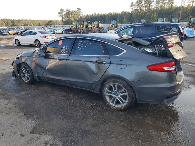 Photo 2 from auction – 2019 FORD FUSION TIT with VIN 3FA6P0RU0KR144832