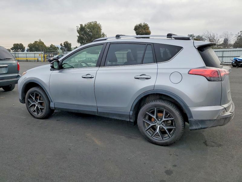 Photo 2 from auction – 2018 TOYOTA RAV4 SE with VIN JTMJFREV0JJ220634