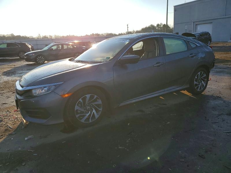 HONDA CIVIC EX 2017 with VIN 19XFC2F76HE082515 - Photo from auction