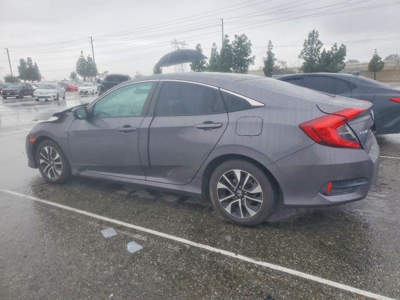 Photo 2 from auction – 2018 HONDA CIVIC with VIN 2HGFC2F55JH502291