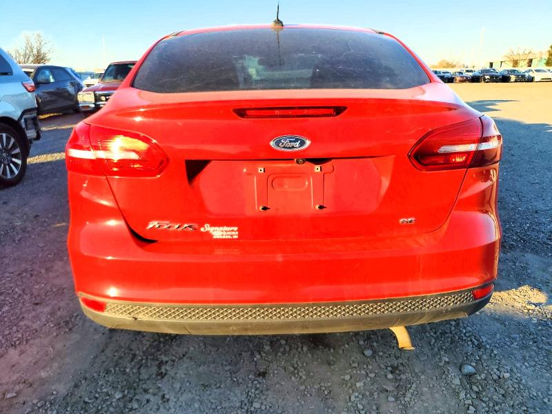Photo 6 from auction – 2017 FORD FOCUS with VIN 1FADP3F20HL233108