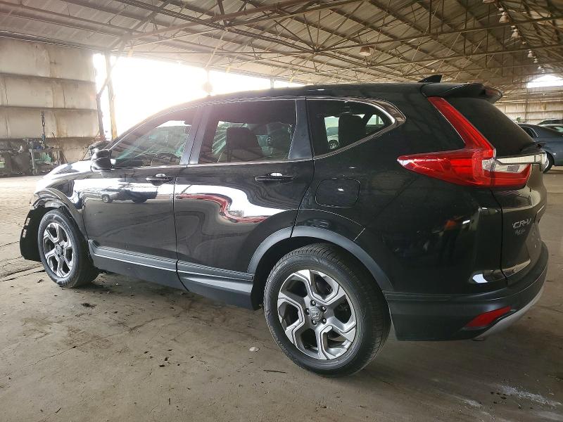 Photo 2 from auction – 2017 HONDA CR-V with VIN 7FARW1H8XHE038682