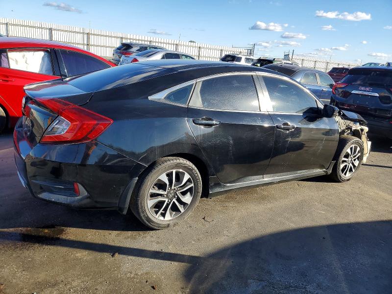 Photo 3 from auction – 2020 HONDA CIVIC LX with VIN 19XFC2F62LE209101
