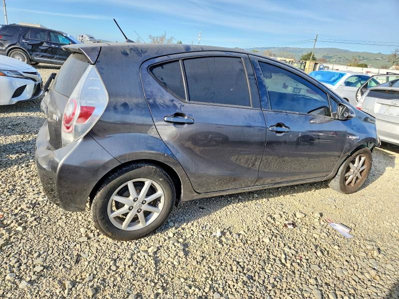 Photo 3 from auction – 2014 TOYOTA PRIUS C with VIN JTDKDTB36E1563044