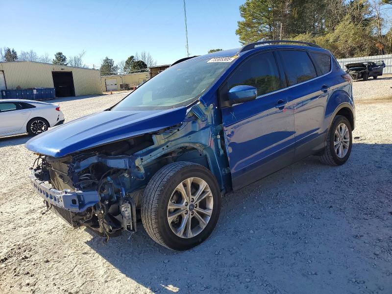 FORD ESCAPE 2018 with VIN 1FMCU0HD0JUA16116 - Photo from auction