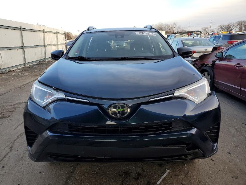 Photo 5 from auction – 2018 TOYOTA RAV4 LE with VIN JTMZFREV3JD129133