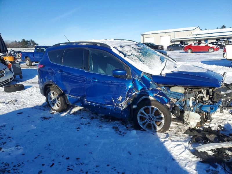 Photo 4 from auction – 2018 FORD ESCAPE with VIN 1FMCU9GD2JUC16050