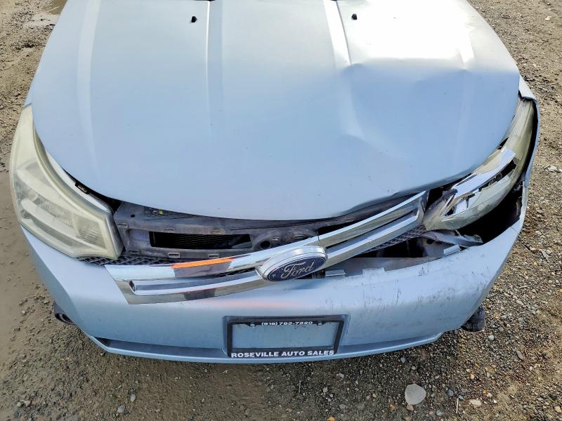 Photo 11 from auction – 2008 FORD FOCUS with VIN 1FAHP35N88W301067