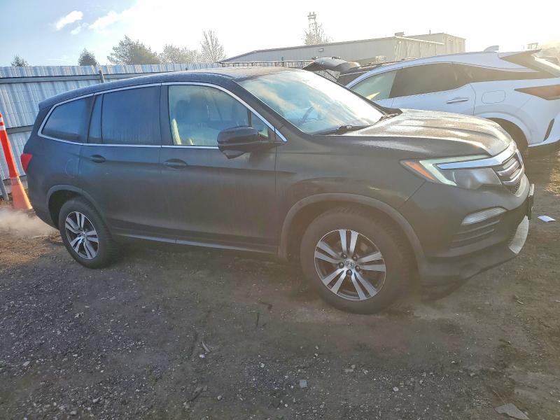 Photo 4 from auction – 2016 HONDA PILOT EXLN with VIN 5FNYF6H78GB074056
