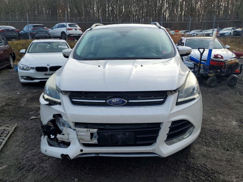Photo 5 from auction – 2016 FORD ESCAPE TIT with VIN 1FMCU9J91GUB44285