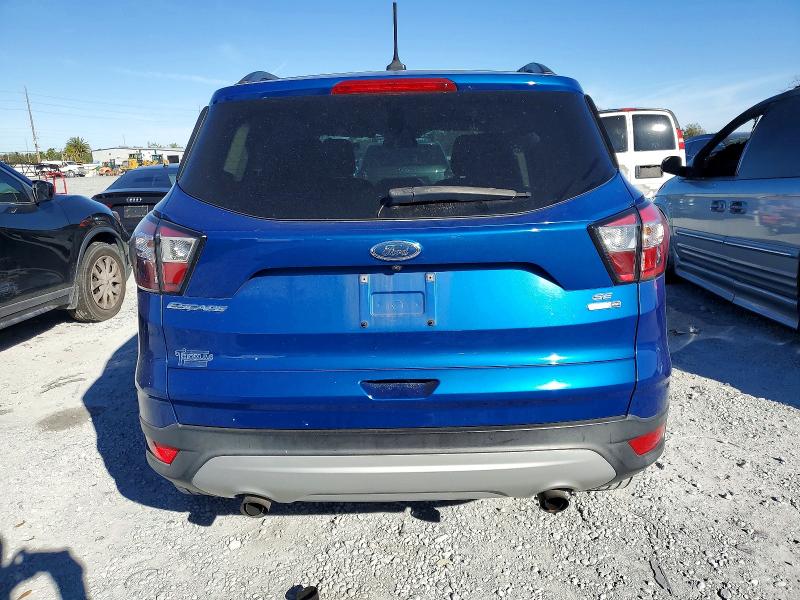 Photo 6 from auction – 2018 FORD ESCAPE SE with VIN 1FMCU9GDXJUA89029