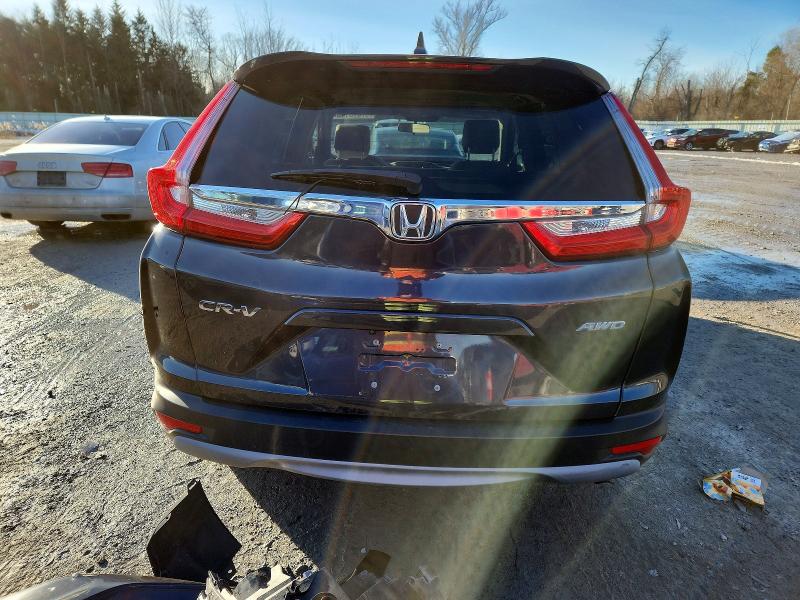 Photo 6 from auction – 2017 HONDA CR-V with VIN 2HKRW2H58HH632079