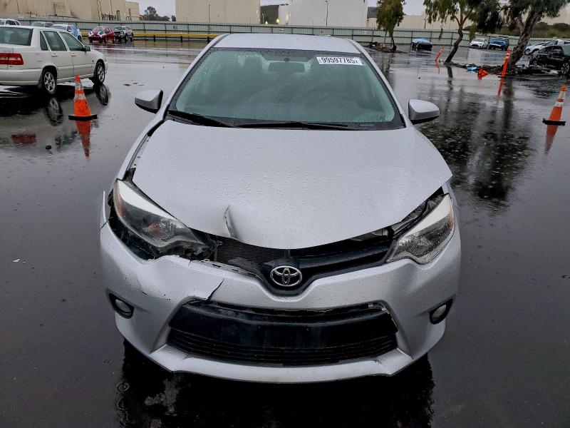 Photo 5 from auction – 2014 TOYOTA COROLLA L with VIN 5YFBURHE3EP106103