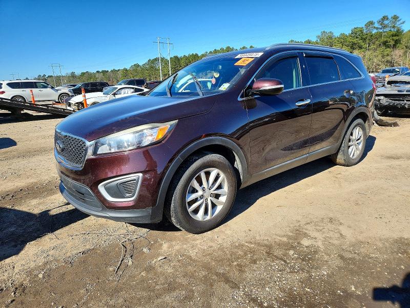 KIA SORENTO LX 2016 with VIN 5XYPG4A37GG048772 - Photo from auction