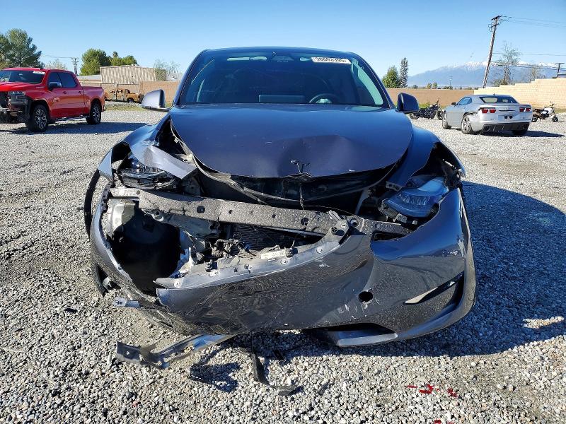Photo 5 from auction – 2023 TESLA MODEL Y with VIN 7SAYGDED8PF944063