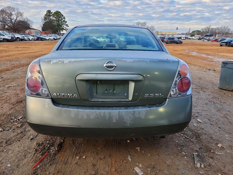 Photo 6 from auction – 2002 NISSAN ALTIMA with VIN 1N4AL11D42C703143