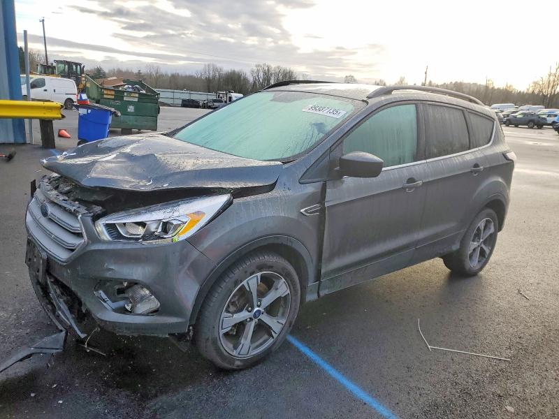 FORD ESCAPE 2018 with VIN 1FMCU9HD8JUB84493 - Photo from auction