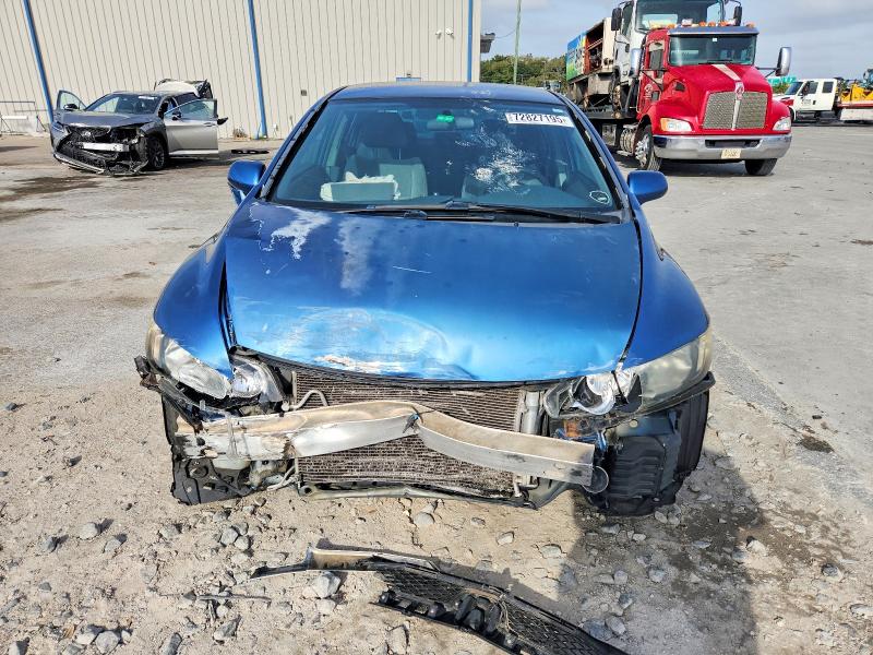 Photo 5 from auction – 2011 HONDA CIVIC LX with VIN 19XFA1F54BE028264