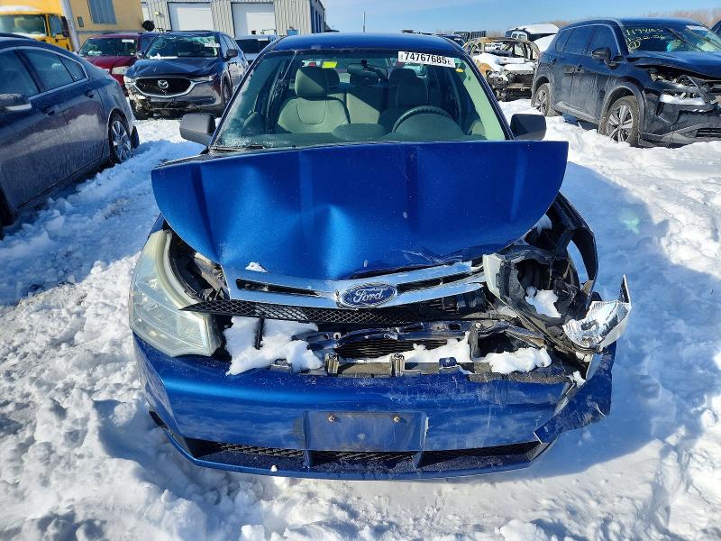 Foto 5 de la subasta – 2009 FORD FOCUS con VIN 1FAHP34N39W263203