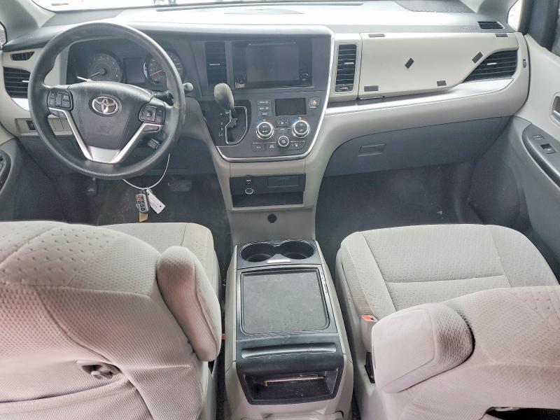 Photo 8 from auction – 2015 TOYOTA SIENNA LE with VIN 5TDKK3DC7FS561004