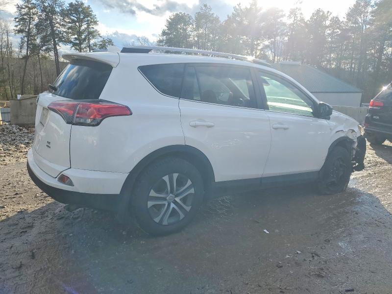 Photo 3 from auction – 2018 TOYOTA RAV4 with VIN 2T3BFREV8JW851699