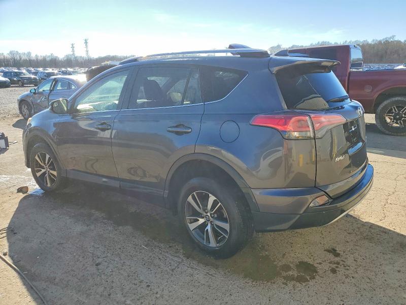 Photo 2 from auction – 2017 TOYOTA RAV4 with VIN JTMRFREV0HJ105125